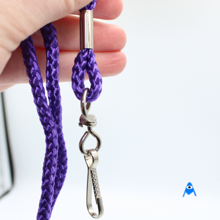 Holding purple lanyard with swivel clip
